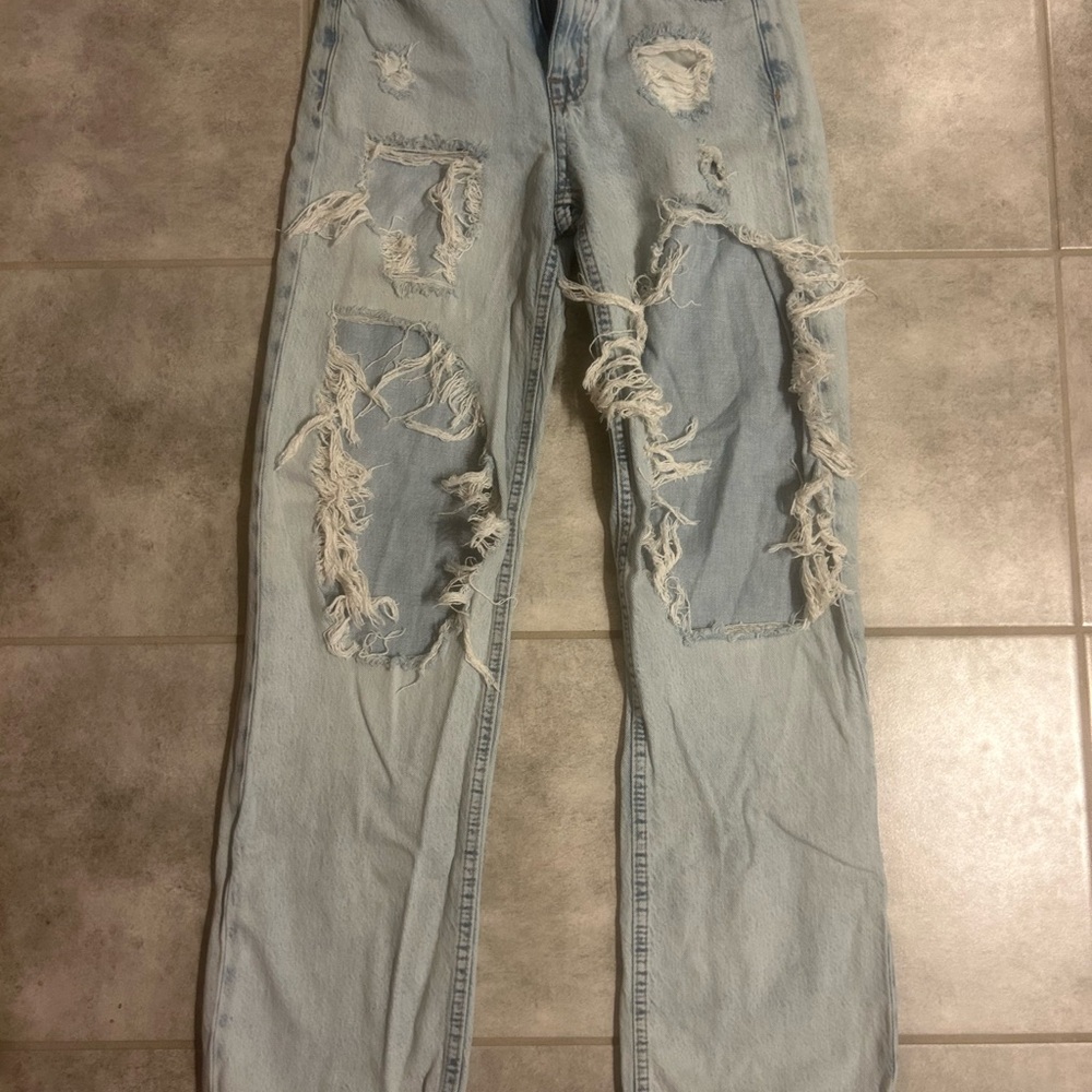 Distressed Light Blue Jeans